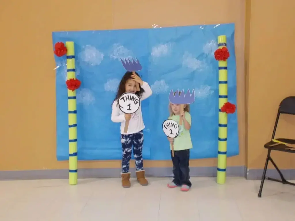 Kids taking photos at Sunrise Children's Foundation NYE Mixer