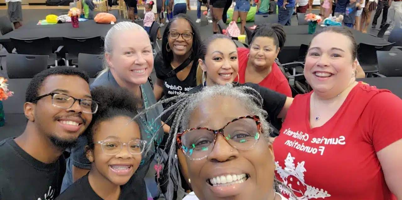 A group of Head Start teachers smiling and taking a selfie at an event, highlighting their teamwork and discussions on Head Start teacher salary raise.